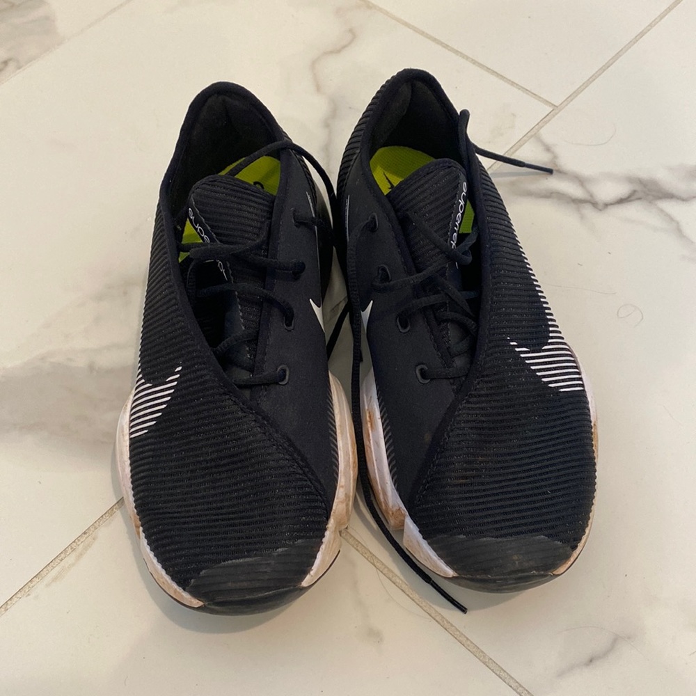 Nike black tennis shoes.